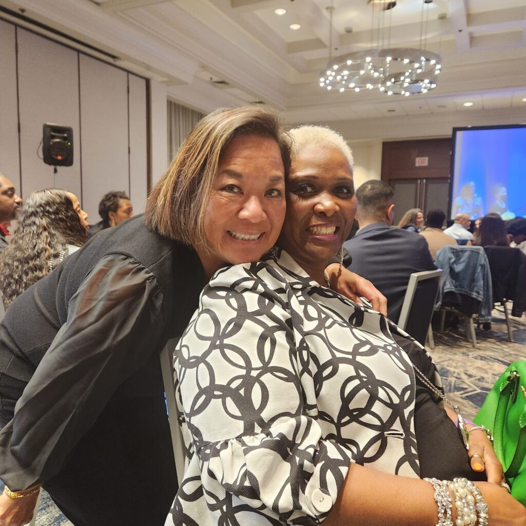 Deb with a friend at the 2023 Coalition of 100 Black Women Silicon Valley Annual Charity Jazz Brunch
